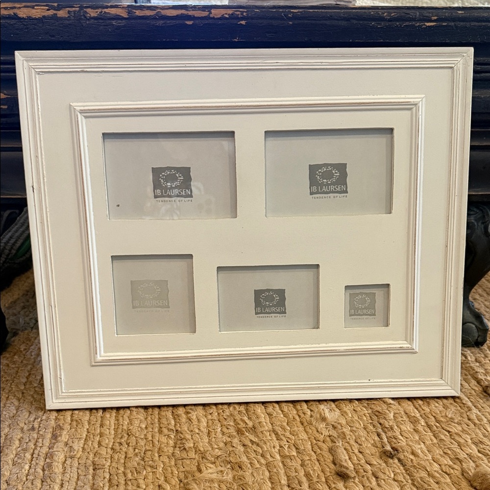 Cream Multi-Photo Wooden Frame for 5 photos. 19” wide, 15” tall. Hooks for wall.